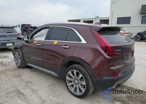2022 Cadillac Xt4 Fwd Premium Luxury from USA, damaged, VIN 1GYFZCR4XNF116845